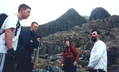 Gary Sinnott, Colm Ennis, Betty Guilfoyle and Paschal Guilfoyle after descending into Stob Coire nam Beith valley with Central Gully and the Church Gate Buttress in the background.